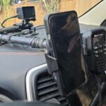 MFC Offroad Utili-Dock with Bulletpoint Mounting Solutions Wireless Phone Charger & CD Mic mount holding a Midland MXT757 Mic. A Powerwerx 75w USB C charger upgrade provide power for the motorized phone cradle and GoPro.