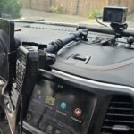 MFC Offroad Utili-Dock with Bulletpoint Mounting Solutions Wireless Phone Charger & CD Mic mount holding a Midland MXT757 Mic. A Powerwerx 75w USB C charger upgrade provide power for the motorized phone cradle and GoPro.